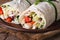 Lavash roll with chicken and vegetables closeup horizontal