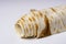 Lavash rolled on a white background, thin traditional oriental bread, Armenian flatbread