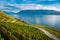 Lavaux, Switzerland: Lake Geneva and the Swiss Alps landscape seen from hiking trail among Lavaux vineyard tarraces in
