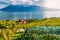 Lavaux, Switzerland: Little town, Lake Geneva and the Swiss Alps landscape seen from Lavaux vineyard tarraces in Canton