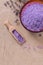 Lavender cooking salt in glass decorative plate with wooden spoon