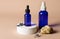 Lavender essential oil and spray in blue glass bottles