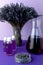 Lavender essential oil for stress relief, sleep and relaxation. Abstract chemical laboratory with glass flask, Petri dish and