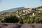 A lavender field with the village of Aurel beyond, the Vaucluse, Provence