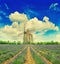 Lavender field with windmill and dramatic blue sky in Provence