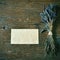 Lavender flowers and blank signboard on a rustic table