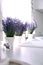 Lavender flowers on countertop near sink in kitchen