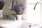 Lavender flowers on countertop near sink in kitchen