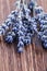 Lavender flowers isolated on wooden background