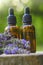 Lavender oil and lavender sprigs.Base cosmetic oil for massage and care for face and body. Lavender Essential Oil Glass