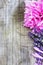 Lavender and peony over wooden background.