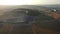 Lavender scented fields in endless rows with blooming flowers aerial view drone purple field against blue sky summer sun