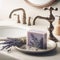 Lavender soap bar in soap dish in modern bathroom environment