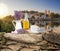 Lavender still life with cup of coffee against Avignon bridge in Provence, France