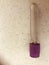 Lavender top ETDA blood sample vacuum tube.