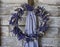 Lavender Wreath on old wooden wall