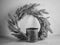 Lavender wreath and rustic metal watering can in black and white monochrome image.  Simple, country home decor