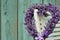 Lavender wreath in the shape of a heart on a chair close-up