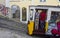 Lavra Funicular going in Lisbon with people in it