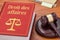 A law book with a gavel - Business law in french - Droit des affaires