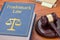 A law book with a gavel  - Trademark law