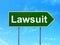 Law concept: Lawsuit on road sign background