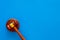 Law and court. Lawyer, attorney, judge concept. Judge gavel on blue background top view copy space