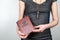 Law and Ethics. Woman with a wooden cross around her neck and a book in hands