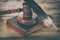 Law gavel or judge mallet and feather pen on a wooden desk