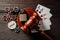 Law and rules for online gambling concept, judge gavel with padlock and aces wooden table