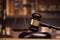 law theme, mallet of the judge, justice scale, books, wooden desk