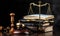 Law theme, mallet of the judge, wooden desk, scales of justice and books. Generative AI