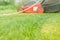 Lawn mower is cleaned from a grass/lawn mower is cleaned from a