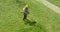 Lawnmover man worker cutting dry grass with lawn mower.