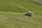 Lawnmower tractor works on a large area with lawn