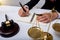 Lawyer Detail of a judge sitting at his desk, studying new laws and legislation and taking notes