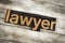 Lawyer Letterpress Word on Wooden Background