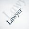 Lawyer word on a white paper