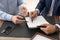 Lawyer working with client at table in office