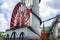 The Laxey Wheel also known as Lady Isabella is built into the hillside above the village of Laxey in the Isle of Man. It is the