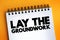 Lay The Groundwork text on notepad, concept background