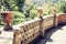 Ð¡lay stands flower pots in a beautiful public garden park Parco Colonna, Taormina, Sicily, Italy - Image