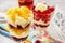 Layer fruit desserts on wooden tray