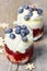 Layer strawberry, blueberry and muesli dessert