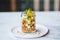 layered apple and cinnamon tartare in clear jar