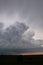 Layered dark clouds over field