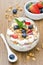 Layered dessert with yogurt, granola, fresh berries