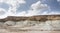 Layered hills of the Ustyurt plateau in the steppe of lime, chalk and sand