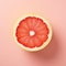 Layered Imagery: A Grapefruit On Pink Background With Subtle Irony