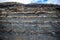 Layered rock of jurassic cliff in Kimmeridge Bay, Devon, prehistoric rocks containing dolomitic limestone and Fossils occur